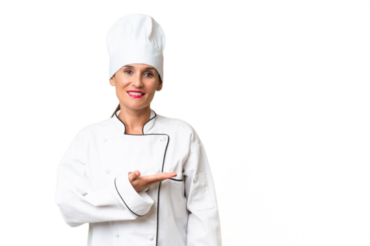Middle-aged chef woman over isolated background presenting an idea while looking smiling towards