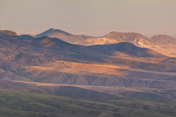 Naklejka premium Sunset over the Caucasus Mountain. Armenia.
