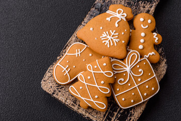 Delicious sweet gingerbread, madeleine biscuits and other elements of Christmas decorations