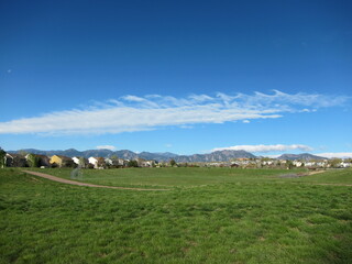 Fototapeta premium Atmospheric gravity waves clouds, Karman vortex breaking waves over Flatirons Boulder, Colorado