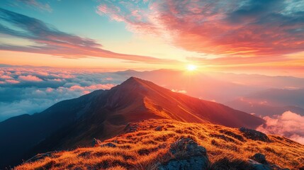 Naklejka premium Breathtaking Sunrise Over Mountain Peak with Colorful Clouds and Rugged Terrain Illuminated by Warm Sunlight, Majestic Landscape Capturing Nature's Beauty at Dawn