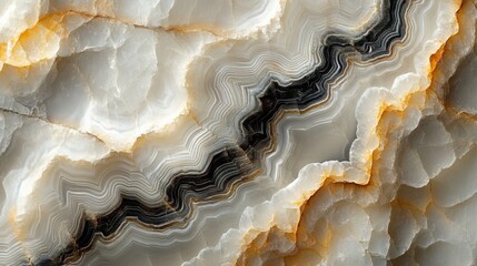 Obraz premium Close-up of a White and Black Agate Stone with Orange and Brown Bands