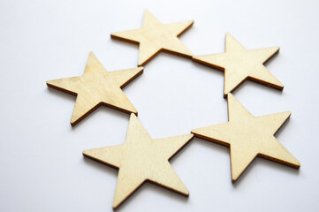 Fototapeta premium wooden stars holiday decorations Christmas winter-themed DIY craft kits own wooden ornaments eco-friendly decor alternatives to plastic decorations minimalist sustainable 