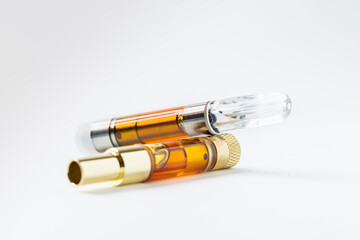 Two Vape Cartridges on white background