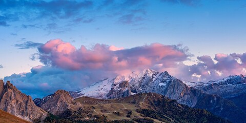 Panoramic view of snow-capped mountains in the Dolomites in Italy.