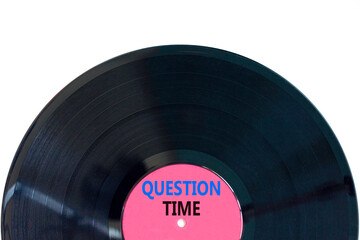 Question time symbol. Concept words Question time on beautiful purple and black vinyl disk. Beautiful white background. Business and question time concept. Copy space.