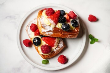 Fruit berry tarts with fresh berries on top, selective focus