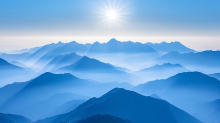 Fototapeta premium A Hazy Blue Mountain Range Under a Bright Sun