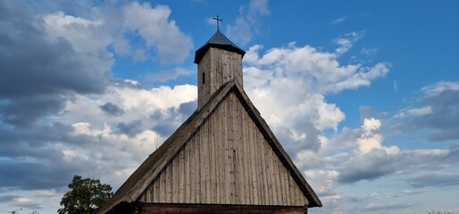 A Catholic wooden church, steeple integrated into the church