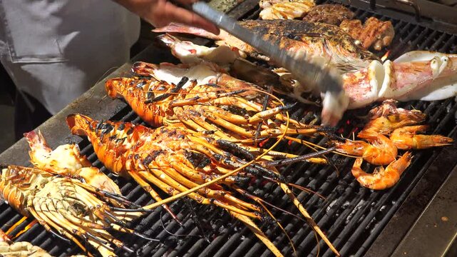 Preparation of shellfish and squid on the grill