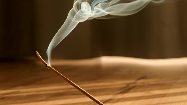 Burning aromatic incense smoky stick for meditation and relaxing. Aromatherapy smoke for yoga concept