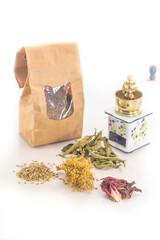 composition of medicinal plants , Aloysia citrodora, Cuminum cyminum, Hibiscus, Laurus nobilis, Sambucus, Thymus vulgaris, cardboard bag, grinder