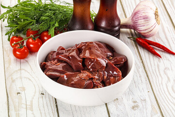 Raw chicken liver uncooked in the bowl