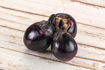 Raw violet and black eggplant
