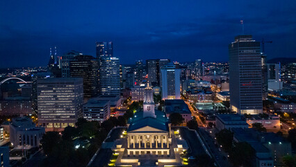 Fototapeta premium Drone view of Tennessee State Capitol at dusk with blue sky