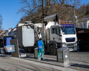 A recycling truck collects paper waste from underground recycling bins in Ljubljana, Slovenia. A...