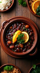 Feijoada Served in a Traditional Clay Pot with Orange Garnish