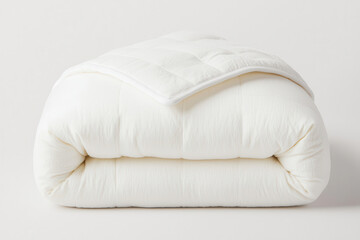 Fototapeta premium Better sleep health concept. Cozy, folded white blanket on a neutral background.