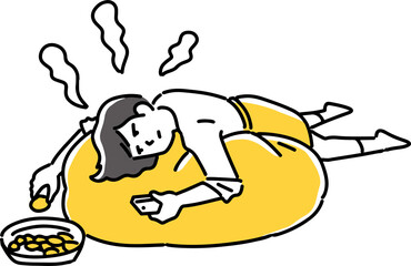 クッションにうつ伏せになる女性