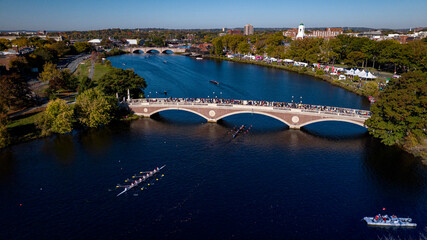 10/22/22 CAMBRIDGE, BOSTON, MA., USA - aerial view of "Head of the Charles" - annual Rowing Contest on Charles River at Harvard in front of Weeks Bridge