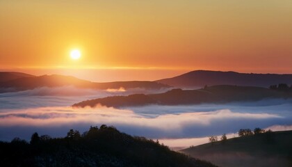 Fototapeta premium scenic view of fog over hills during sunrise