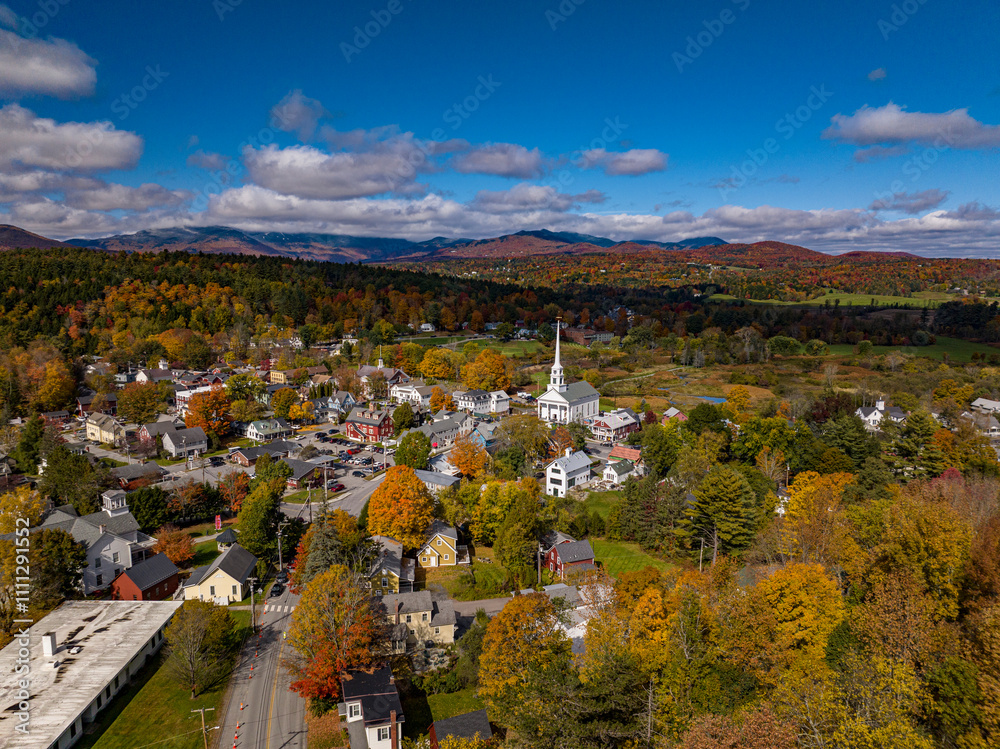 Wall mural 10/7/22 STOWE VERMONT USA - elevated view of picture perfect Stowe Vermont in Autumn Color