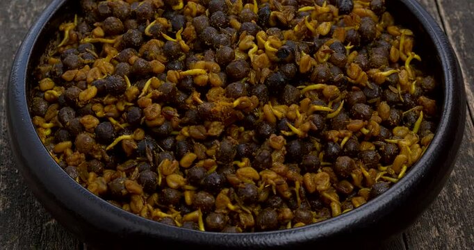 Close-up view of Methi Kerau. SDried Nepalese peas cooked with sprouted fenugreek seeds and spices. This is an authentic Newari dish. 