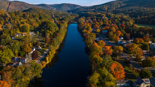 10/12/22 SHEFFIELD FALLS, MA., USA - aerial view Housatonic River running through town, Berkshire Mountains