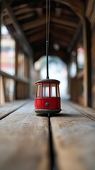 Cable car isolated on wooden background