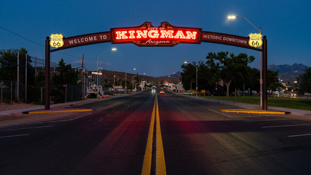 August 27, 2022, KINGMAN, ARIZONA, USA - neon sign at sunset welcomes visitors to historic Kingman AZ