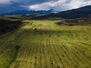 9/9/22 RIDGWAY COLORADO, USA - Hay bales in front of San Juan Mountains outside of Ridgway off Highway 62 on Ralph Lauren's Double RL Ranch