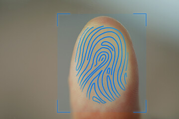 Man scanning fingerprint, closeup. Friction ridges pattern