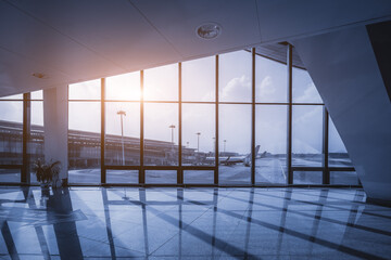 Modern Airport Interior with Panoramic Windows and Airplane View
