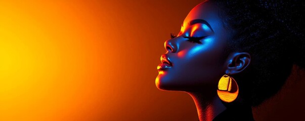 A woman with perfect, glowing skin, illuminated by soft studio lighting