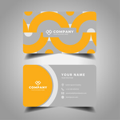 Stylish gray and orange business card with a professional and contemporary layout.