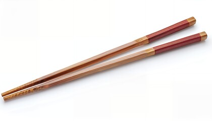 Fototapeta premium Wooden chopsticks with red tips isolated on white background.