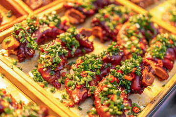 Deliciously Glazed Pork Ribs Garnished with Fresh Herbs and Spices