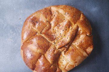 Enjoy the taste of Freshly Baked Bread with a Crispy Crust and Toppings