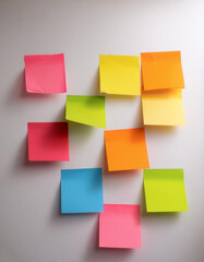 Fototapeta premium Colorful sticky notes arranged like a mosaic on white