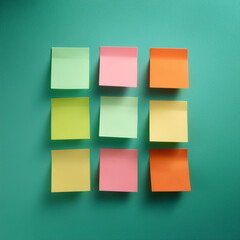 Fototapeta premium Colorful sticky notes arranged like a mosaic on Pastel mint green
