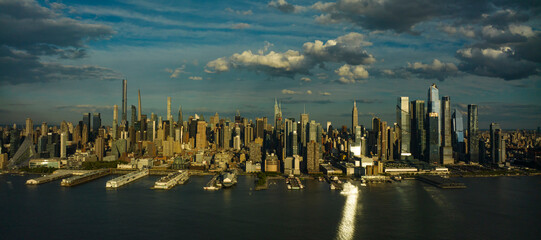 MAY 1, 2023, NEW YORK, NY, USA - sunset dusk view over Hudson River from Weehawken, NJ of New York City