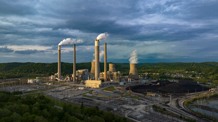 MAY 8, 2023 - POCA, WEST VIRGINA - USA - aerial view of Jon Amos Power plant shows smoke stacks and cooling - Coal