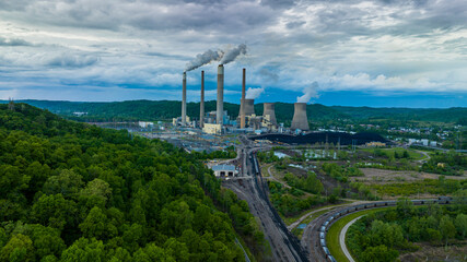 MAY 8, 2023 - POCA, WEST VIRGINA - USA - aerial view of Jon Amos Power plant shows smoke stacks and cooling - Coal