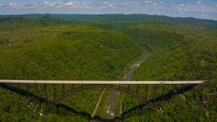 MAY 8, 2023, FAYETVILLE, WEST VIRGINIA, USA - US 19 crosses famous New River Gorge Bridge over New...