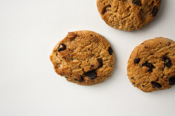 Chocolate chip cookies on white background. Overhead shot concept
