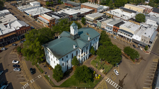 JULY 8, 2023, OXFORD, MS., USA - town courthouse and surrounding stores in historic ole' Miss hometown of University and symbol of south