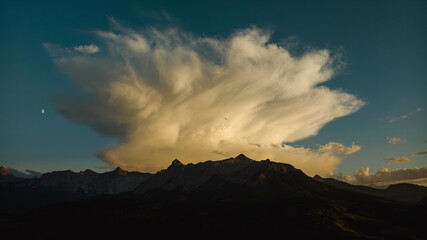 OCTOBER 13, 2023, HASTINGS MESA, COLORADO, USA - sunset with spectacular mountain clouds San Juan Mountains near Ridgway Colorado