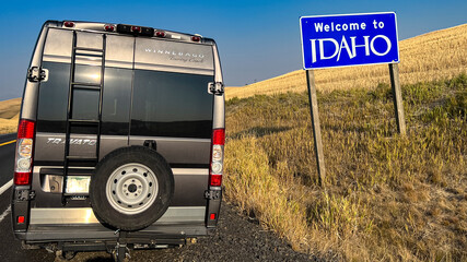 Welcome to Idaho - photographer Joe Sohm with RV crossing state line