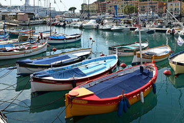 Obraz premium Traditional colorful fishing boats, called pointu in French. in Nice Port, Nice, France on sunny summer day.