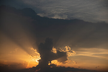 Stormy night cloud. Sunset sky dramatic sunset clouds and sunset sunrays. Beautiful colorful dramatic sky with clouds at sunset or sunrise. Sun rays. Skyscape nature composition. Natural sky